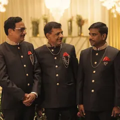 For a special family wedding, the Jain brothers wanted coordinated yet personalized outfits. We designed these matching black bandhgala suits, each tailored to the individual's preference while maintaining a unified, elegant look.