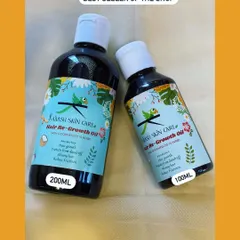 Meet my all time bestseller, the Hair Re-Growth Oil. I make this using a traditional recipe with more than 15 potent herbs to help reduce hair fall, fight dandruff, and promote new growth. It's available in both 100ml and 200ml bottles.
