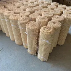 A view of our warehouse stock of export-grade cane webbing rolls. We supply these materials in bulk for large-scale interior projects, including custom wall paneling, cabinet inserts, and furniture manufacturing for our B2B clients.