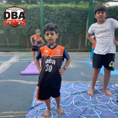 Confidence and focus on display. We teach our young boys and girls how to hold their bodies with strength and stability, building physical and mental resilience that translates directly to their performance in sports.