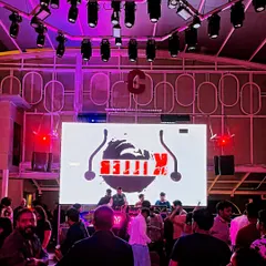 A wide view from a packed weekend gig. The right combination of sound, lighting, and visuals is key to creating an immersive experience, and I work with venues to make sure the production is top-notch.