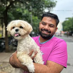 The pure joy on this man's face while holding his dog Gillu says it all. My goal is to create photos that aren't just portraits, but reflections of the happiness pets bring into our lives.
