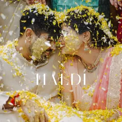 In a shower of marigold petals and pure joy, this is the heart of a Haldi ceremony. I focus on these unscripted moments of laughter and connection, where the turmeric paste becomes a paint of happiness.