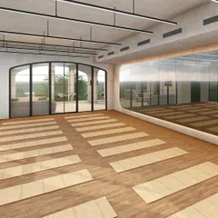 I designed the Yoga Hall at Ignite + Aliign Studio in Bengaluru as a tranquil retreat for mindfulness and movement. The warm wooden flooring, minimalist lighting, and arched glass doors connect the interior to the outdoors, fostering a sense of calm and focus.