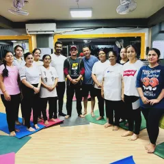 A group photo with our yoga family. The smiles and positive vibes after a class are the best reward.