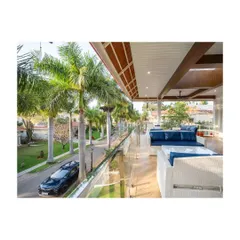 Step into luxury with this glimpse of the villa's outdoor balcony oasis. The plush seating and stunning view invite indulgence and relaxation, elevating outdoor living to new heights.