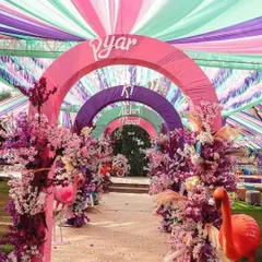Make a grand statement from the very first step. This vibrant, multi-colored arched entryway was designed for a fun-filled Haldi ceremony, setting a joyful and festive tone for the event.