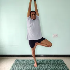 Vrikshasana (Tree Pose). A classic balancing posture that builds focus and stability in the legs and hips. The key is to keep the hips level and the spine tall.