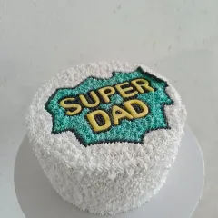 A fun "Super Dad" themed cake to celebrate your hero. The design is piped with buttercream, making the whole cake a delicious treat for Father's Day.