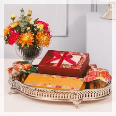 A majestic silver tray filled with our Diwali bestsellers. This large hamper includes beautifully boxed sweets, jars of our signature cookies, and a fresh floral arrangement to complete the festive look.