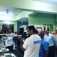 Demonstrating the features of a competition-grade air rifle to our guests. It is important to me that everyone understands the equipment they are using.
