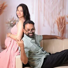 Another playful pose from the same maternity session, showing the happy anticipation of the parents-to-be.