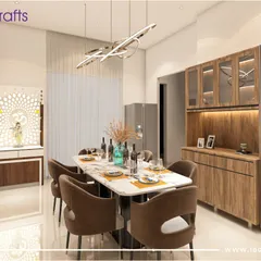 The dining area in our 'Majestic Fortune' project features a beautiful marble-top table and a custom crockery unit. Adjacent to it is a Vastu-compliant pooja unit with an intricate 'Om' jali, blending spirituality seamlessly into the home's design.