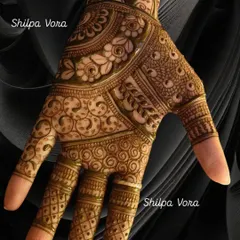 A simple palm design, perfect for a guest who wants a touch of henna.