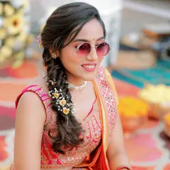 My cool bride Apurva, rocking sunglasses with her traditional Haldi outfit. The look is fun, fresh, and full of personality.