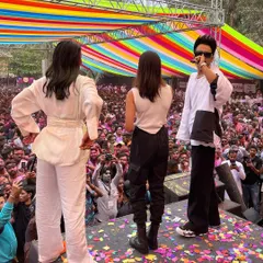 A shot from the stage at the Rang Barse Holi festival, showing the artists' view of the massive crowd. I provide coverage that includes both the audience and the performers.
