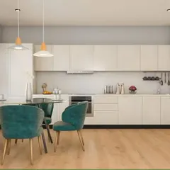 This open-plan space features a straight kitchen that blends seamlessly with the dining area. The all-white cabinets and light wood flooring create a bright, Scandinavian-inspired look.