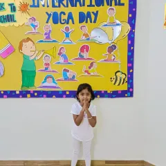 Another student celebrating International Yoga Day. Our yoga sessions are always playful and adapted for young children.