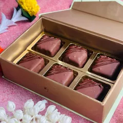 These Nutella Fudge Bites are a Diwali special. Each bite is a rich, creamy Nutella fudge wrapped in velvety chocolate, perfect for gifting or indulging.