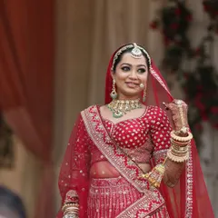 A classic Indian bridal look is all about timeless elegance. Here, I focused on creating a polished, glowing complexion paired with defined eyes and a beautiful red lip, perfectly balancing the intricate details of her traditional wedding attire.