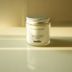 The 100g candle, like this 'Black Cherry' one, is perfect for smaller spaces like a bathroom or bedside table.