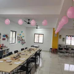 A simple and sweet setup with pink balloons. My studio is a versatile space that can be decorated for any kind of celebration.