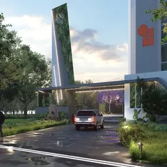 The gateway for 'Suyug The 1' features twin towers with a dramatic, angled porte-cochère. My landscape design complements this modern architecture with lush, layered greenery and a wet-look driveway, seamlessly blending the built form with the natural environment.