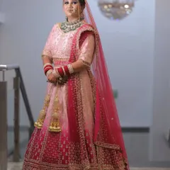 A beautiful full-length portrait of one of my lovely brides. She looks absolutely radiant in her pink ombre lehenga, and I was so honored to be a part of her special day.