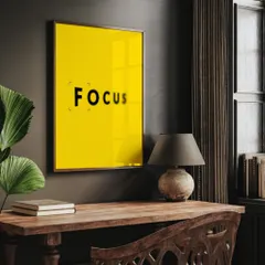Our "FOCUS" print in a dark, moody study. The bright yellow provides a stunning pop of color, while the simple frame ensures the message remains the center of attention.