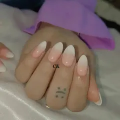 A perfect example of a classic baby boomer or ombre French manicure on elegant almond-shaped nails.