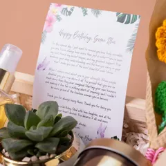 A heartfelt, personalized birthday letter included in the 'Tropical Dream' hamper. A handwritten or custom-printed note adds a deeply personal and emotional touch.