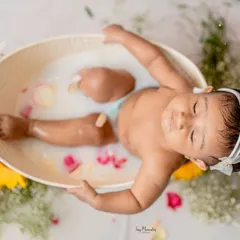 A moment of pure serenity. Floral milk bath sessions are a beautiful and unique way to capture your baby in a peaceful, artistic setting.