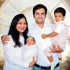 A beautiful first portrait as a family of four. We captured this moment in our studio, welcoming their newborn daughter alongside her proud big brother.