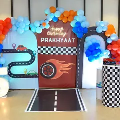 Ready, set, go. This amazing race car theme for a fifth birthday was so much fun. We photograph the full decor to capture the party's atmosphere.