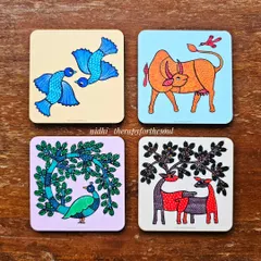 A closer look at four of the coaster designs, featuring birds, a cow, a peacock, and deer in the vibrant Gond style.