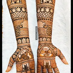 Your love story, woven into your bridal mehndi. This full-arm design features personalized names and wedding details, surrounded by traditional motifs like elephants, peacocks, and lotuses. I work to make every line clean and every detail perfect.