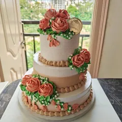 The full view of the stunning three-tiered anniversary cake, a perfect centerpiece for a landmark celebration.