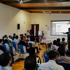 Presenting at an INSCA conference on the application of Olympic lifting across various sports. My goal in these sessions is to bridge the gap between academic research and practical, on-the-floor coaching, providing other coaches with actionable, evidence-based strategies.