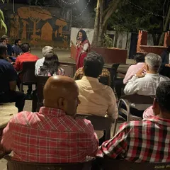 A wider view of an event I hosted. My role as a host is to guide the conversation and ensure the audience feels connected to the speakers and the topic.