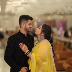 A playful and adorable moment captured between the couple. Her makeup looks fresh and stays put, allowing her to enjoy every moment.