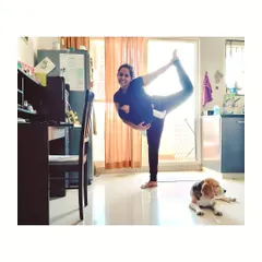 Here I am, finding a moment for a Dancer's Pose in my living room, with my two babies nearby. This is what real-life practice looks like for a mom. My online classes are designed to fit into your world, helping you find that essential 'me time' and strength amidst the beautiful chaos of motherhood.