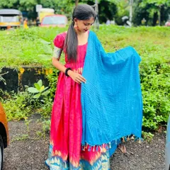 This is one of my favorite projects where I turned a client's old saree into a brand new dress. This vibrant pink anarkali-style gown keeps the beautiful border of the original saree, giving it a fresh and modern life.