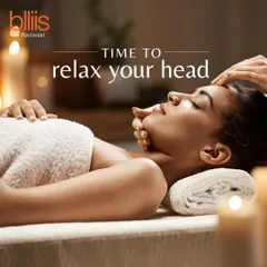 It is time to relax your head. In this image, a client receives a calming head and temple massage in our serene, candlelit treatment room, designed to melt away tension and quiet the mind.