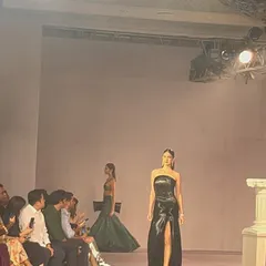 Another stunning design on the runway. The energy and artistry at these shows are a constant source of inspiration for my work in fashion law.