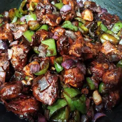 Every Bengali household has its own version of this Tangra-style chilli chicken. My version is dry, spicy, and goes brilliantly with noodles or rotis, a true taste of Kolkata's unique Chinese food culture.