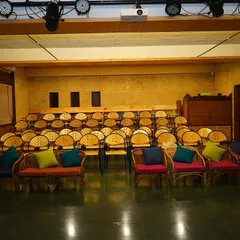 Our performance hall, ready for an audience. The flexible seating arrangement, with its mix of chairs and comfortable sofas, ensures that every seat has a great view and feels close to the action.