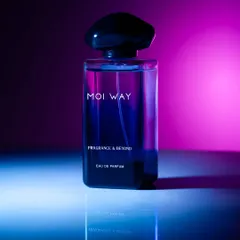 Using colored gels to light this perfume bottle with a vibrant pink and blue gradient. This technique creates a futuristic, neon-noir mood that is modern and eye-catching.