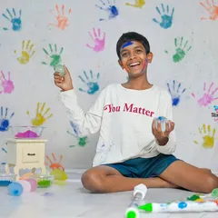 Holi is a festival of joy, and these photoshoots capture that perfectly. We use a colourful handprint backdrop and safe, vibrant powders for a fun and memorable session. It's even more fun when a furry friend joins in!