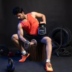 This image captures a male model in a classic workout pose, highlighting muscle definition while holding the whey protein container. It’s a perfect visual for marketing materials targeting bodybuilders and serious gym-goers, combining aspirational fitness with clear product placement.