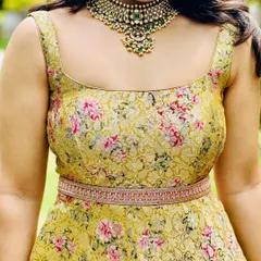 Amulya looks ethereal in this hand-stitched gown made from a floral brocade fabric. I added a custom hand-embroidered waist belt to define the silhouette and add a touch of sparkle.